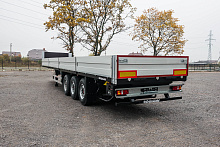 Полуприцеп бортовой Grunwald Gr-OSSt новый