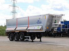 Полуприцеп зерновоз самосвальный ТОНАР 9594 42 м3 Алюминиевый с дополнительной боковой разгрузкой но