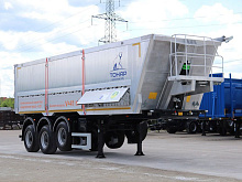 Полуприцеп зерновоз самосвальный ТОНАР 9594 42 м3 Алюминиевый с дополнительной боковой разгрузкой но