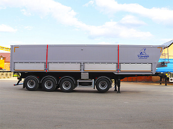 Полуприцеп зерновоз самосвальный ТОНАР 9599 50 м3 Алюминиевый с дополнительной боковой разгрузкой но