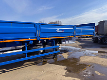 Полуприцеп бортовой ЧМЗАП 9906.4 П45 (с кониками и фитингами) новый