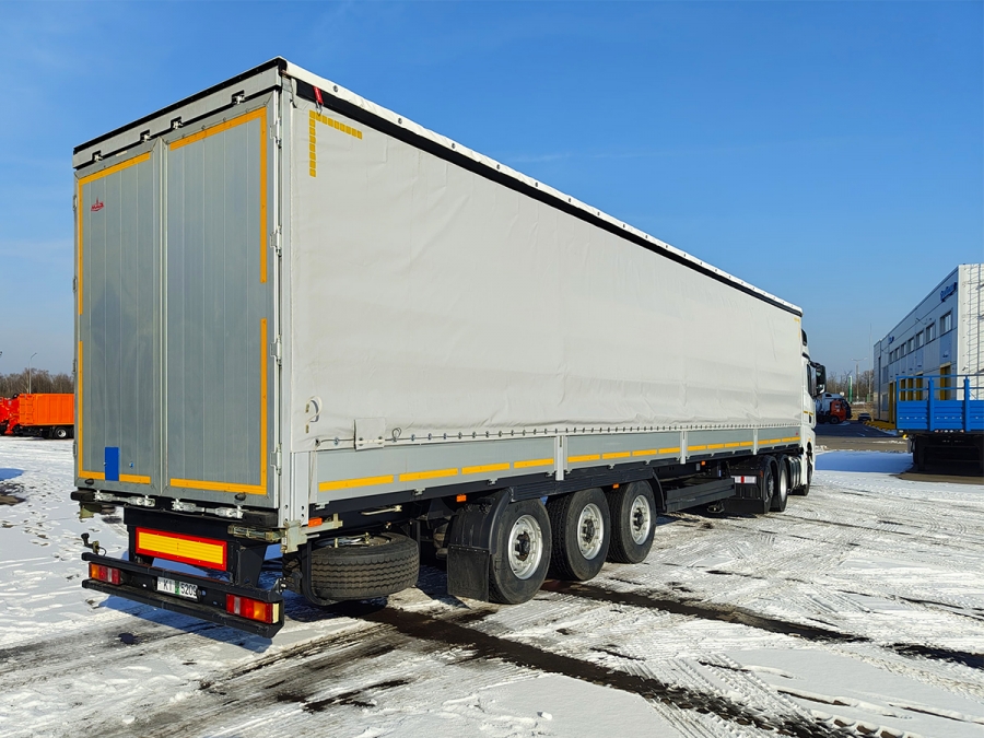 Полуприцеп шторно-бортовой МАЗ 975830-3028-000 новый