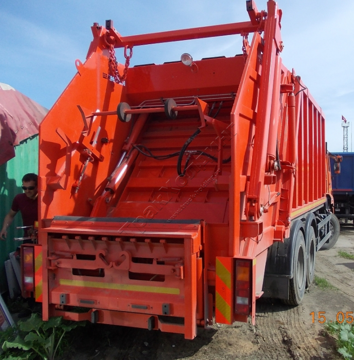 Мусоровоз с задней загрузкой КО-427-01 на шасси КАМАЗ 65115 (ЕВРО 5) новый